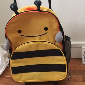 Kids rolling suitcase.